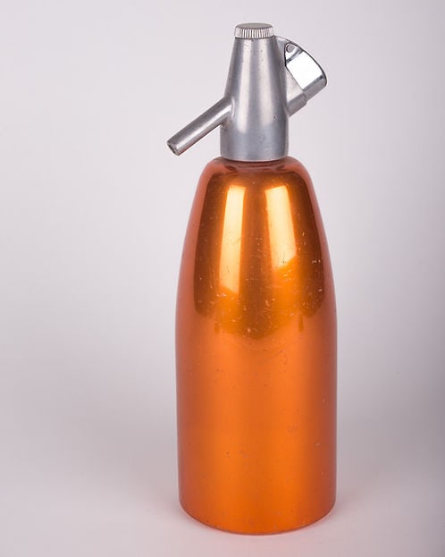 French mid century seltzer bottle 1960: Decorative french seltzer bottle metal frame .The siphon was invented in 1829 in France. What began as a water purification system (carbonation kills germs) became a celebration of accessible potable