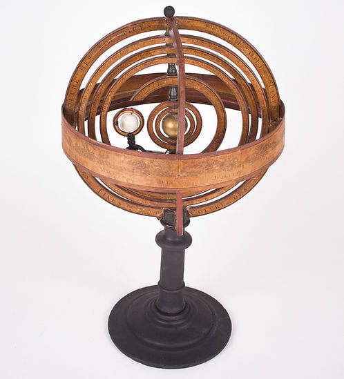 French Copernican heliocentric Armillary Sphere Delamarche: This Armillary Heliocentric Sphere is a scientific instrument that was used to demonstrate the heliocentric model of the solar system, which places the sun at the center of the universe. The sphere