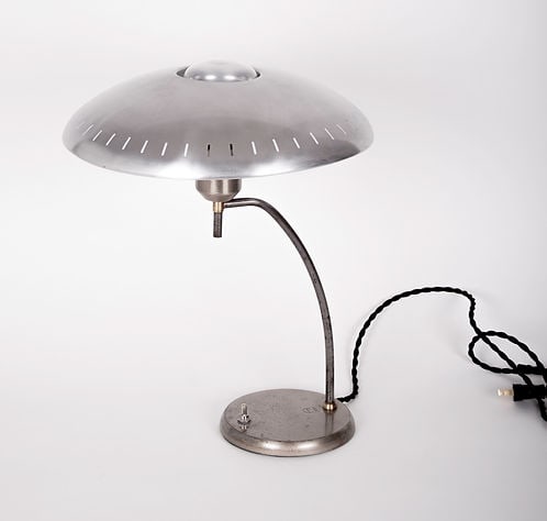 1950's Philips Desk Lamp designed by Louis Kalff Junior: While at Philips, Kalff helped define the overall color, material, and form choices for a variety of projects. He also designed advertisements, branding, exhibitions, lighting, and various other