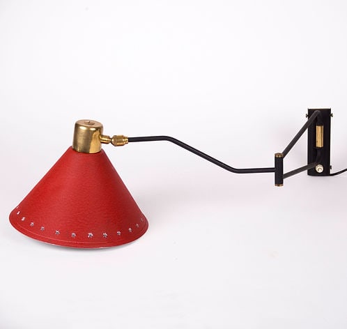 French mid century Rene Mathieu Adjustable Wall Lamp Editions Lunel: Cone " diabolo " swing arm wall light by Rene Mathieu for Lunel, France 1950, original dark red ( grenat ) colored enameled metal shade with decorative star perforations on an articulate brass arm and