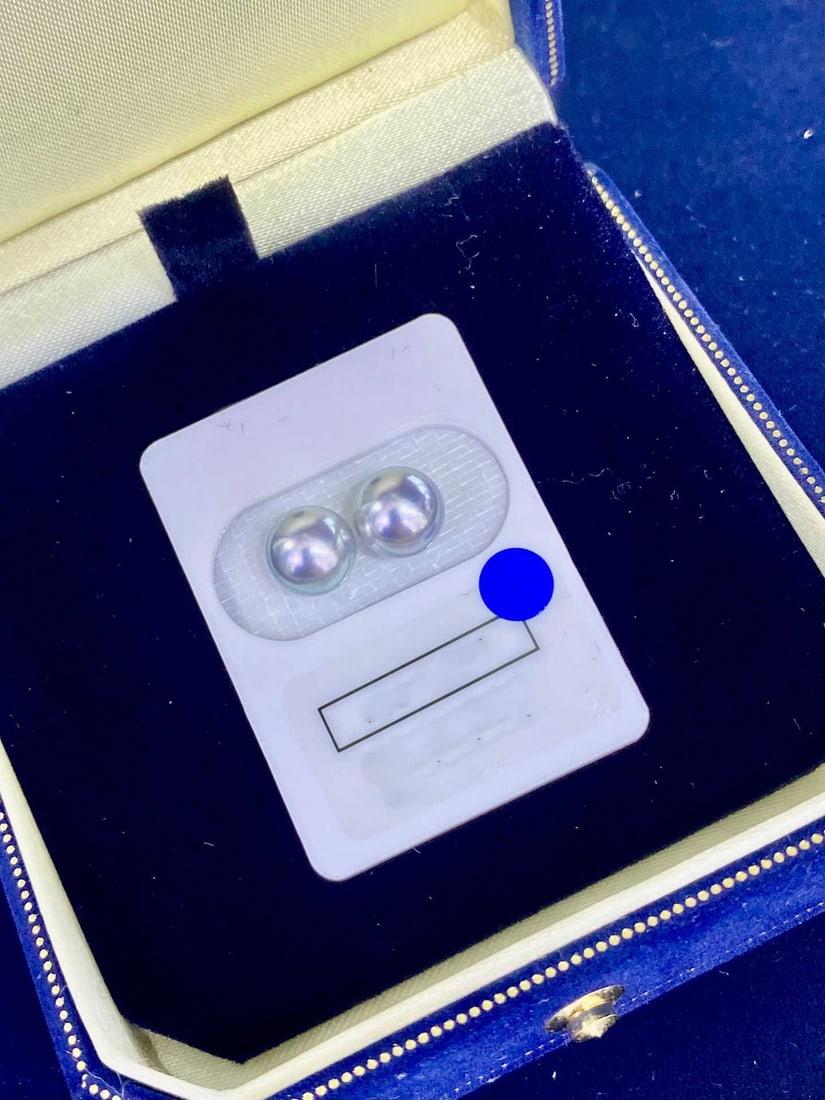 Natural Akoya Pearl Earrings: Title: Natural Akoya Pearl Earrings Description: These earrings feature natural Akoya pearls with an enchanting aurora blue hue. The pearls' perfectly round shape and minimal blemishes highlight