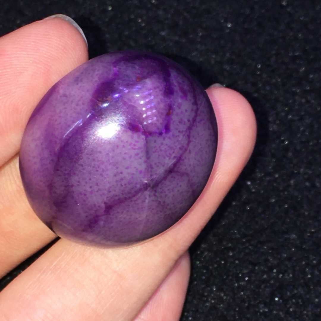 Sugilite Pendant: Title: Sugilite Pendant Description: This Sugilite pendant showcases unique colors and textures, captivating the beholder. Its exquisite design and elegant shape make it a prized collectible. When