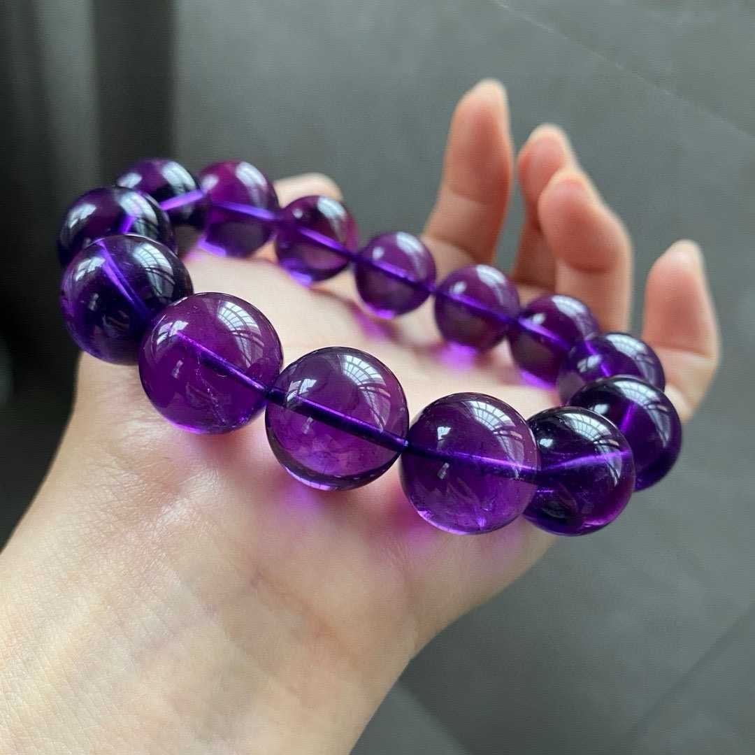 Natural Amethyst Bracelet: Title: Natural Amethyst Bracelet Description: This bracelet is made of natural amethyst, showcasing a rich purple hue symbolizing the guardian of love. The bead diameter is moderate, providing