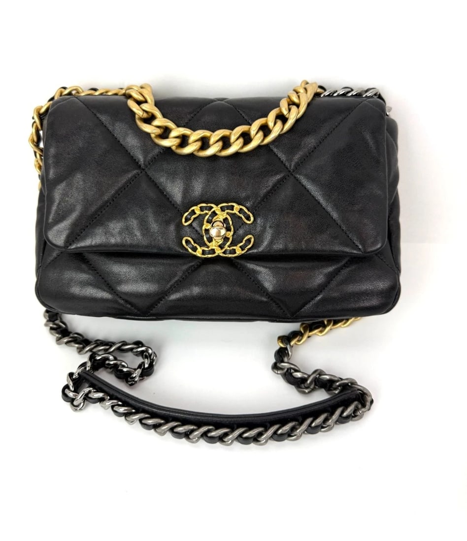 Chanel 19 Large Lambskin Quilted Small Black Smooth Flap Bag: Title: Chanel 19 Large Lambskin Quilted Small Black Smooth Flap Bag Description: Pre-Owned 100% Authentic Chanel 19 Large Lambskin Quilted Small Black Smooth Flap Bag RATING: A/B...Very Good, well mai