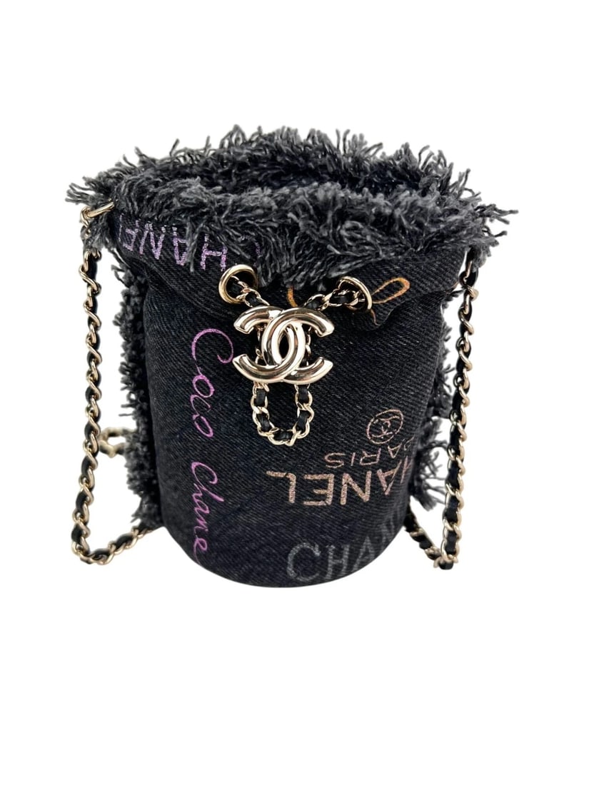 Chanel Denim Quilted Mood Mini Bucket With Chain Black: Title: Chanel Denim Quilted Mood Mini Bucket With Chain Black Description: Pre-Owned 100% Authentic Chanel Denim Quilted Mood Mini Bucket With Chain Black This chic shoulder bag is crafted of
