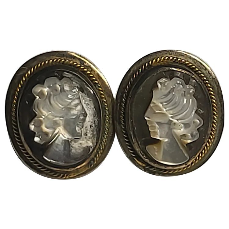 Vintage Mother of Pearl Camo Earrings: Title: Vintage Mother of Pearl Camo Earrings Description: Vintage Mother of Pearl Camo Earrings Date/Period: Vintage Materials: Pearl Size: .25 x .25 inches Reserve: $45.00 Shipping: Domestic: