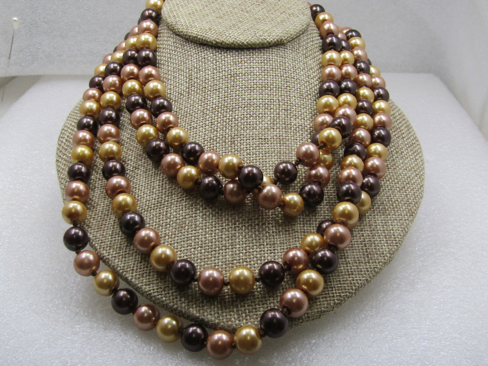 Vintage Brown & Tan 10mm Pearl Necklace 78", Faux Tahitian: Title: Vintage Brown & Tan 10mm Pearl Necklace 78", Faux Tahitian Description: Vintage Brown & Tan 10mm Pearl Necklace 78", Faux Tahitian in three shades of brown - cream to chocolate brown. This is k