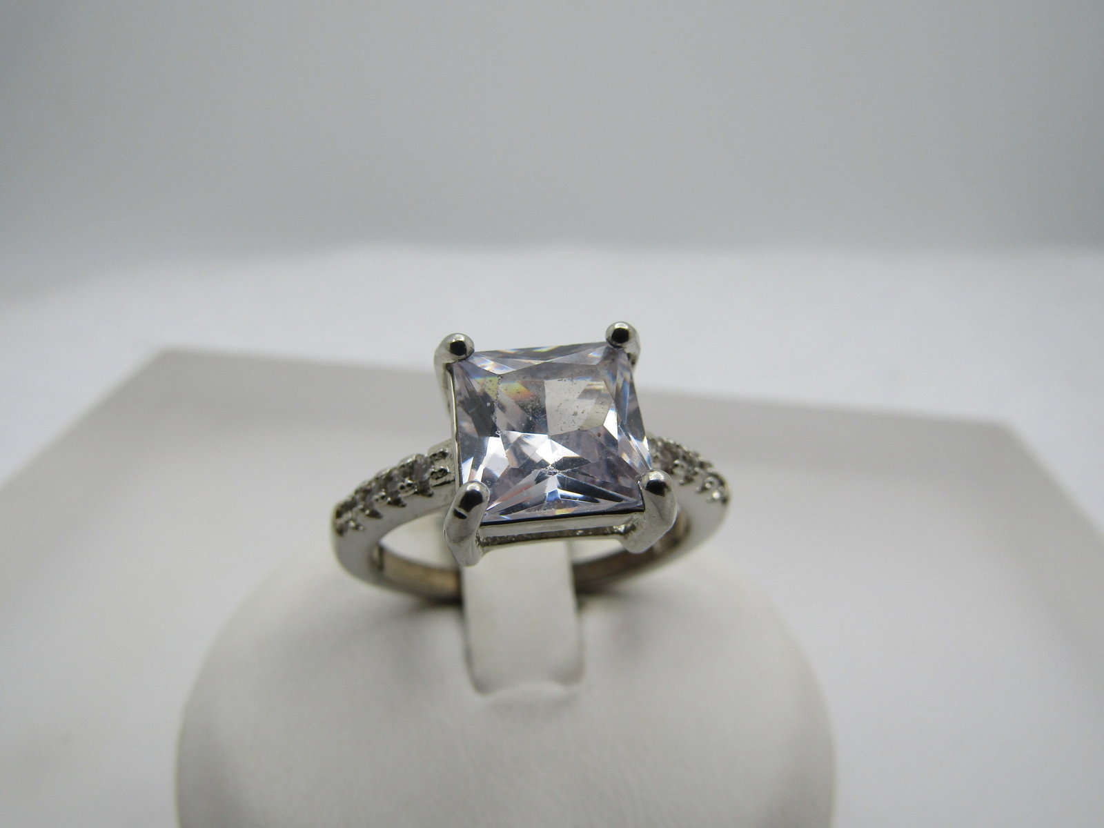 Silver Plated Square Paste Engagement Ring, Sz. Sz. 7.5",: Title: Silver Plated Square Paste Engagement Ring, Sz. Sz. 7.5", Description: Silver Plated Square Paste Engagement Ring, Sz. Sz. 7.5", The main stone is an 8mm square brillian style cut which is the 