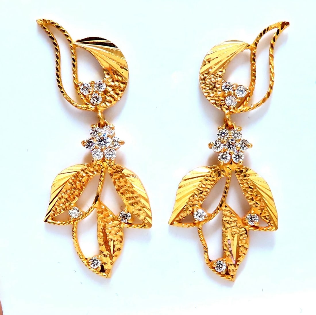 22kt Gold Diamonds Dangle Floral Patina Earrings**: Title: 22kt Gold Diamonds Dangle Floral Patina Earrings** Description: Floral Dangle Earrings Hand Carved Graver Patina Etch Comfortable Screw Backs .60ct natural round diamonds, H-color Vs-2 clarity