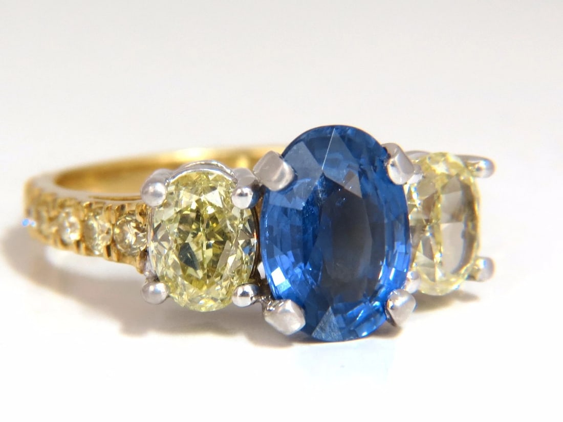 GIA Certified 5.42ct Natural No Heat Sapphire Yellow Diamonds Ring 18kt*v: Title: GIA Certified 5.42ct Natural No Heat Sapphire Yellow Diamonds Ring 18kt*v Description: Three Stone Royale. GIA Certified 3.14ct. Natural Blue Sapphire ring. Report: 1182115083 (attached) Oval c