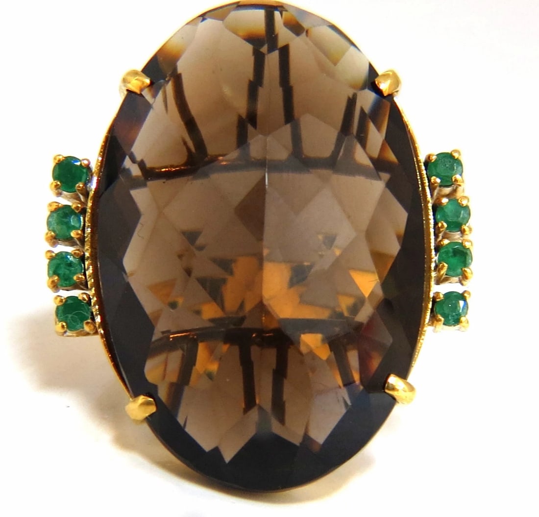 38.30ct Natural Oval Gypsy Topaz Ring 14kt gold *v: Title: 38.30ct Natural Oval Gypsy Topaz Ring 14kt gold *v Description: Oval Gypsy Prime 38ct. Natural oval Topaz Ring Topaz: 20 x 31mm Clean Clarity & Transparent .30ct. Side natural round emeralds.
