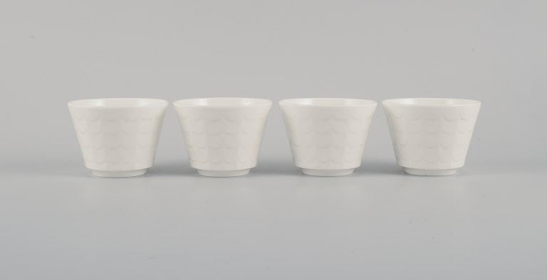 Wilhelm Kåge for Gustavsberg. Four flower pot covers in porcelain. Swedish design, 1960s. - 3