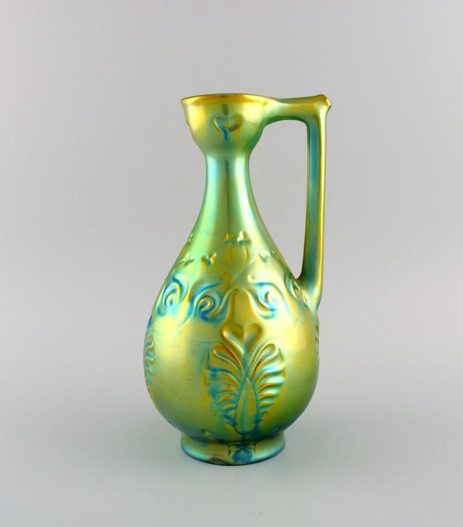 Zsolnay jug in glazed ceramics modeled with foliage. Beautiful eosin glaze. 1960s. - 2