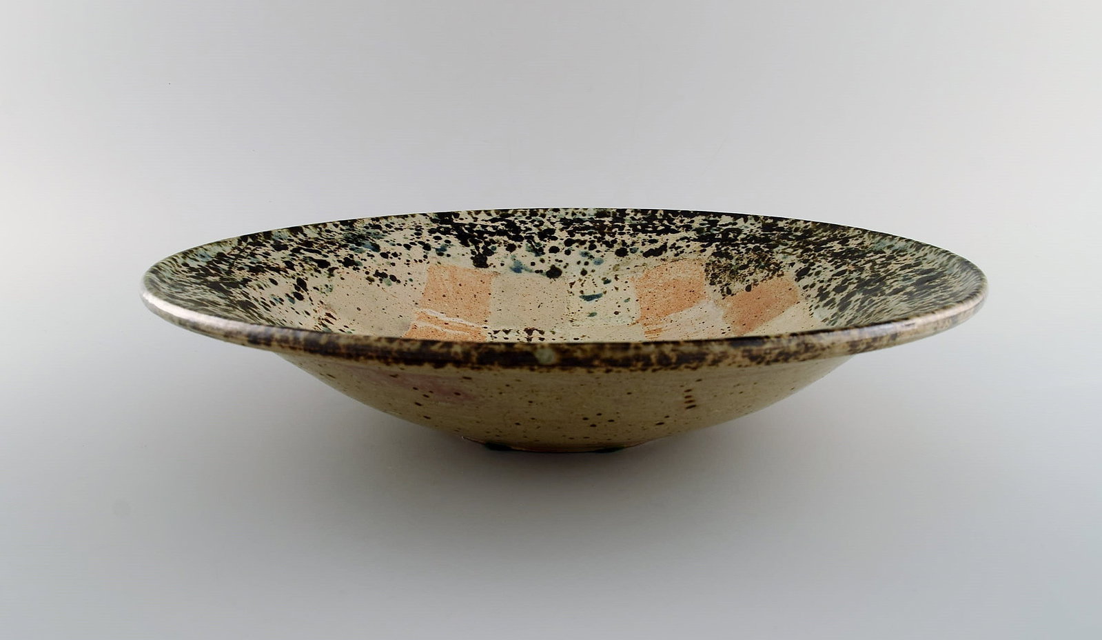 European studio ceramicist. Large unique bowl in glazed stoneware with checkered pattern. Dated - 5