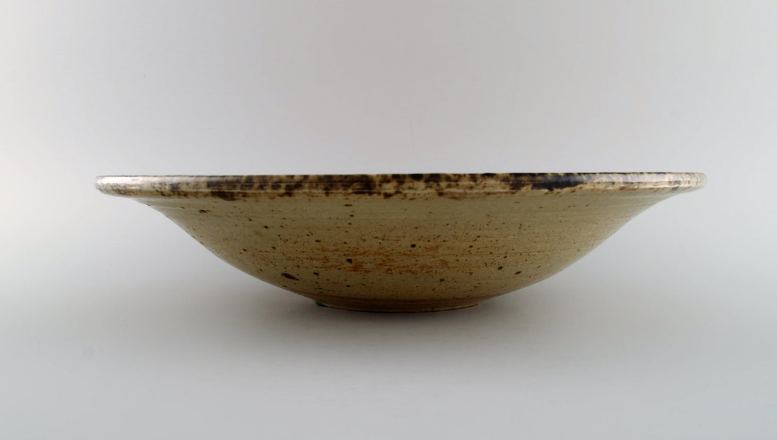 European studio ceramicist. Large unique bowl in glazed stoneware with checkered pattern. Dated - 6