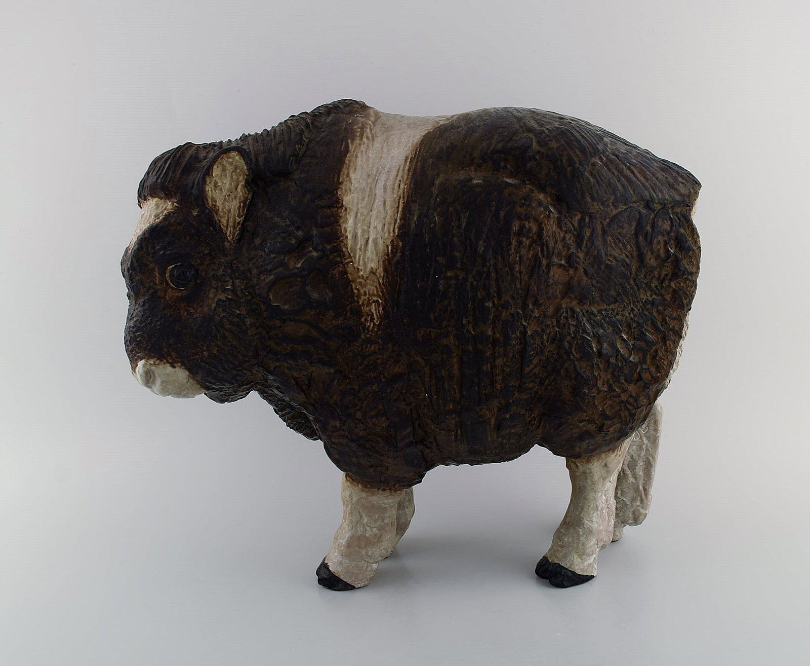 Jeanne Grut for Aluminia. Colossal sculpture in glazed ceramics. Musk ox calf. 1950s.: Jeanne Grut for Aluminia. Colossal sculpture in glazed ceramics. Musk ox calf. 1950s. Measures: 41 x 19 cm. Height: 34 cm. In excellent condition. Stamped. Reserve: $875.00 Shipping: Domestic: Shippin