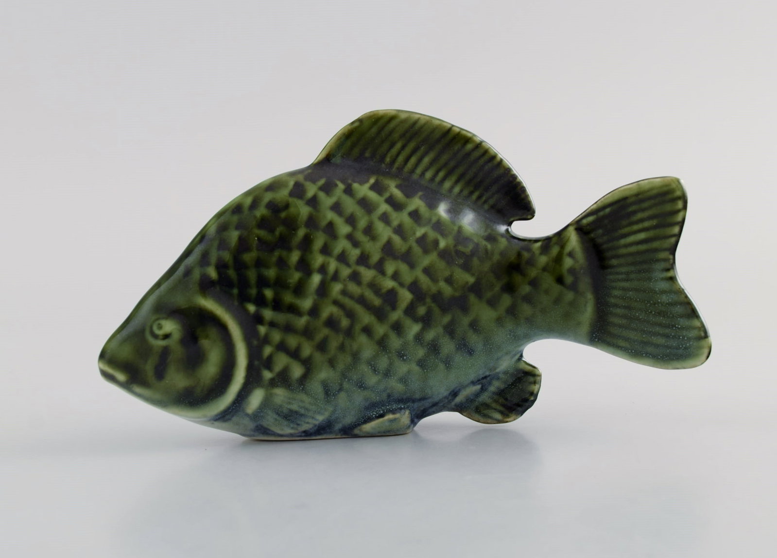 Sven Wejsfelt (1930-2009) for Gustavsberg. Unique Stim fish in glazed ceramics. Perch. 1980s.: Sven Wejsfelt (1930-2009) for Gustavsberg. Unique Stim fish in glazed ceramics. Perch. 1980s. Measures: 15 x 8 cm. In excellent condition. Stamped. Reserve: $189.00 Shipping: Domestic: Shipping rates