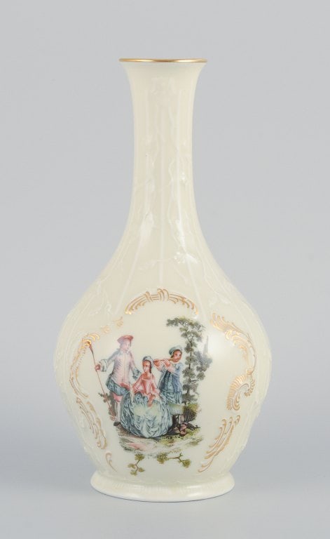 Rosenthal, Germany. "Sanssouci", cream colored vase decorated with figures and gold decoration.: Rosenthal, Germany. "Sanssouci", cream colored vase decorated with figures and gold decoration. Approx. 1930s. In perfect condition. First factory quality. Marked. Dimensions: H 20.0 x D 10.5 cm.
