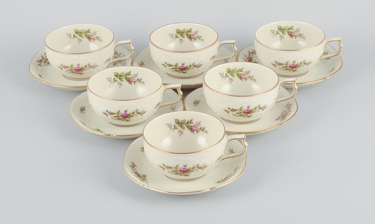 Rosenthal, Germany. "Sanssouci", six cream colored teacups with saucers decorated with flowers and (1 of 8)