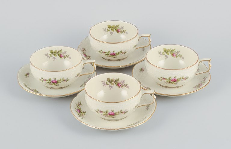 Rosenthal, Germany. "Sanssouci", four cream colored teacups with saucers decorated with flowers and: Rosenthal, Germany. "Sanssouci", four cream colored teacups with saucers decorated with flowers and gold. Approx. 1930s. In perfect condition. First factory quality. Marked. Dimensions: Cup: D 9.3 x
