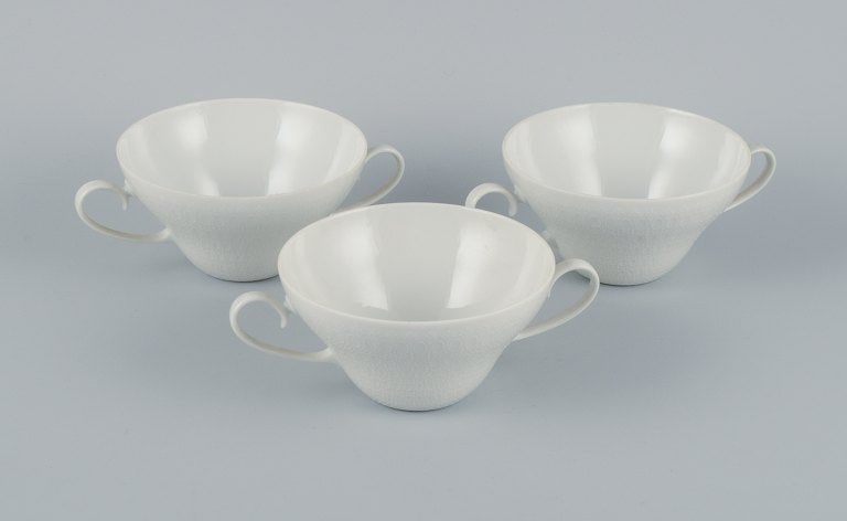 Bjørn Wiinblad for Rosenthal, a set of three bouillon cups.: Bjørn Wiinblad for Rosenthal, a set of three bouillon cups. 1980s. In perfect condition. Marked. Dimensions: D 11.8 (without handle) x H 6.5 cm. Reserve: $168.00 Shipping: Domestic: Shipping