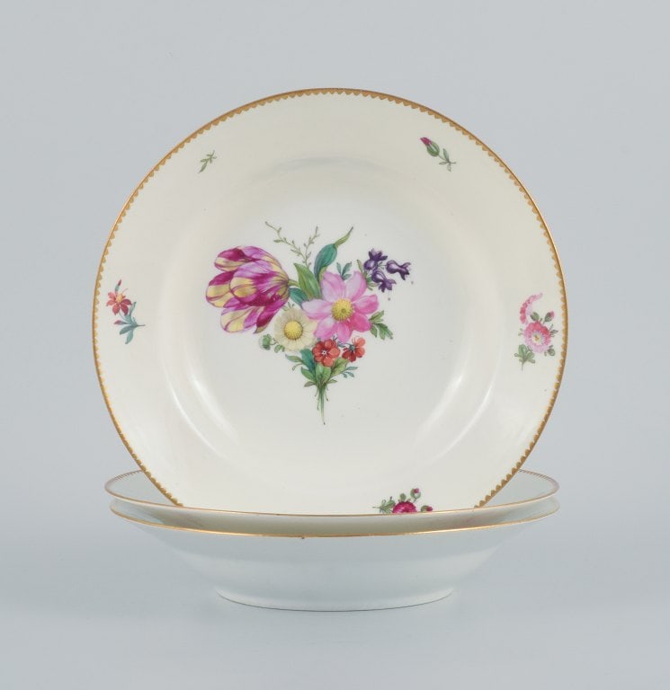 B&G, Bing & Grondahl Saxon flower. Three deep plates decorated with flowers and gold rim. (1 of 6)