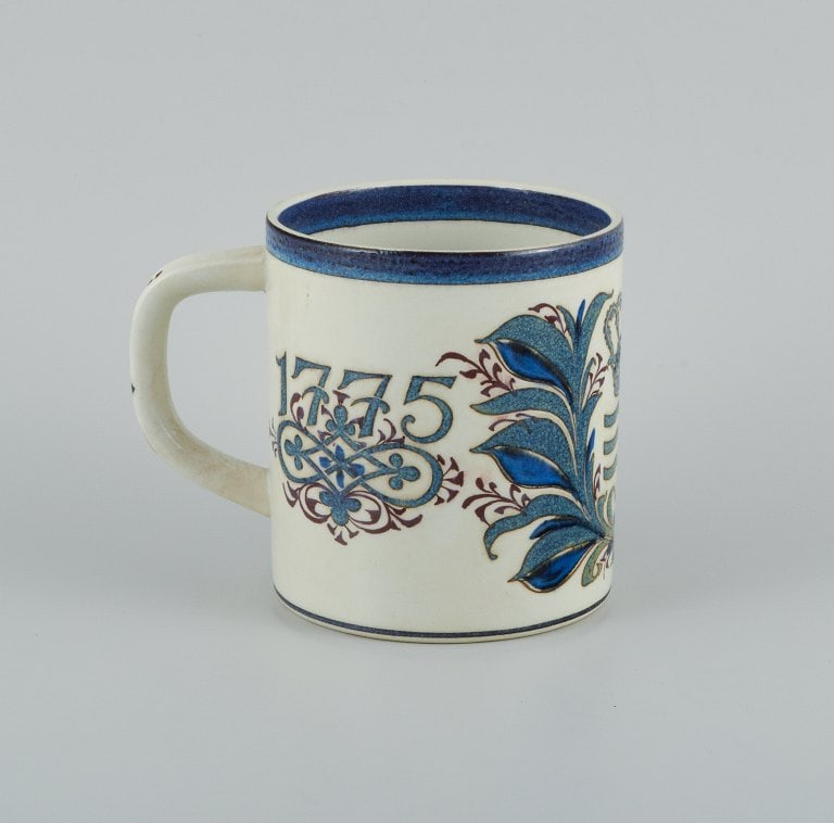 Nils Thorsson for Royal Copenhagen. Large anniversary mug in earthenware. 1775-1975. - 2