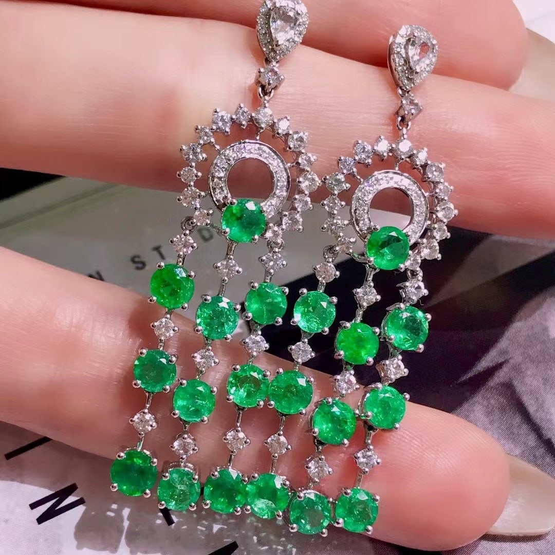 14K GOLD 5.4 CT VIVID GREEN NATURAL EMERALD and SAPPHIRE EARRINGS: Title:14K GOLD 5.4 CT VIVID GREEN NATURAL EMERALD and SAPPHIRE EARRINGS Description:Ref:230678248Gold Content:14K GoldMain Gemstone:EmeraldShape:RoundCarat Weight:5.4ct Color:Vivid GreenTreatment:Natu