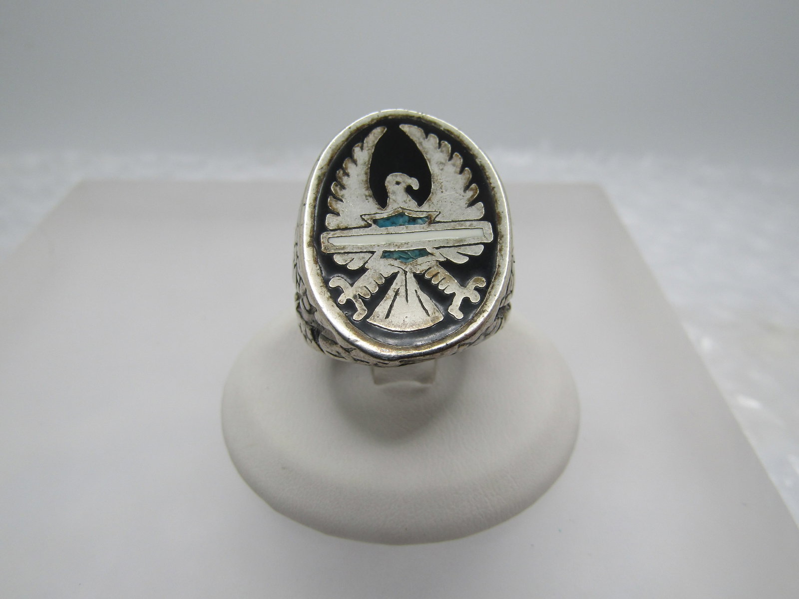 Silver Plated Eagle Biker Ring, Inlaid Turquoise Chips, Sz. 7: Title: Silver Plated Eagle Biker Ring, Inlaid Turquoise Chips, Sz. 7 Description: Silver Plated Eagle Biker Ring, Inlaid Turquoise Chips, Sz. 7. Black enameled background with a turquoise chip