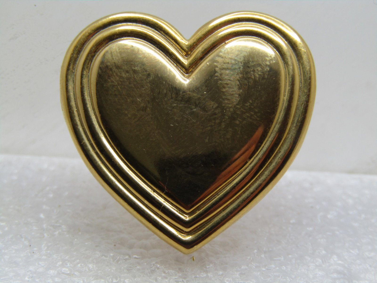 Variety Club Heart Brooch, Late 1900's: Title: Variety Club Heart Brooch, Late 1900's Description: Variety Club Heart Brooch, Late 1900's. It is appx .1" tall and 1" wide. Gold tone and marked The Variety Club. These pins were made by the