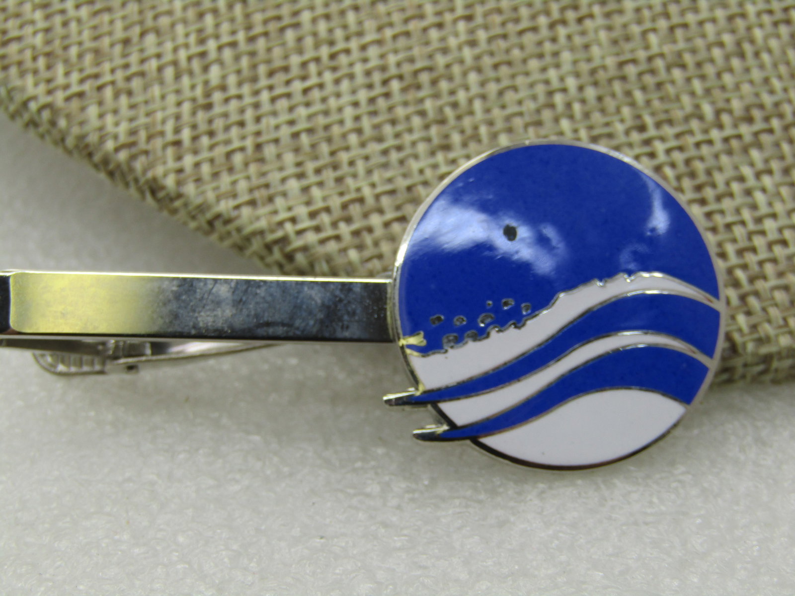 Vintage Sterling Blue & White Enameled Tie Bar: Title: Vintage Sterling Blue & White Enameled Tie Bar Description: Vintage Sterling Blue & White Enameled Tie Bar, Airline?. This has a 1" round blue and white wave or air current look to it. It is si