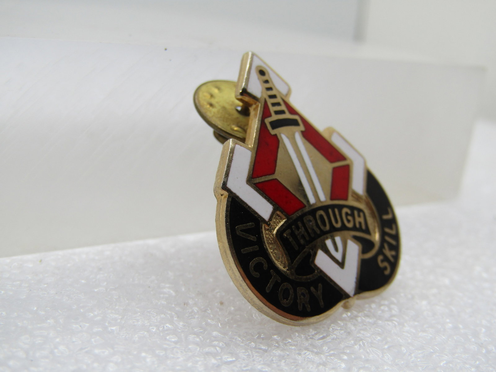 Vintage Enamemled Victory through Skill Army Tack Pin. Unit Crest. 1960's or After. - 2