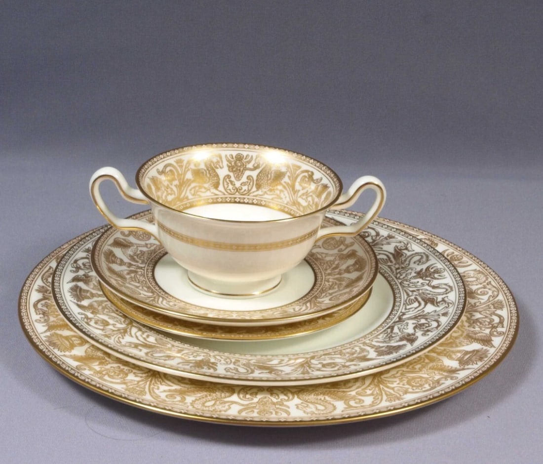 Wedgwood FLORENTINE GOLD PLACE SETTING Dinner Salad Bread Bowl England W4219: This is a beautiful Place Setting with Cream Soup Bowl. The set is made by WEDGWOOD in Florentine Gold pattern. There are few patterns that live up to the richness of Florentine Gold. It was first int