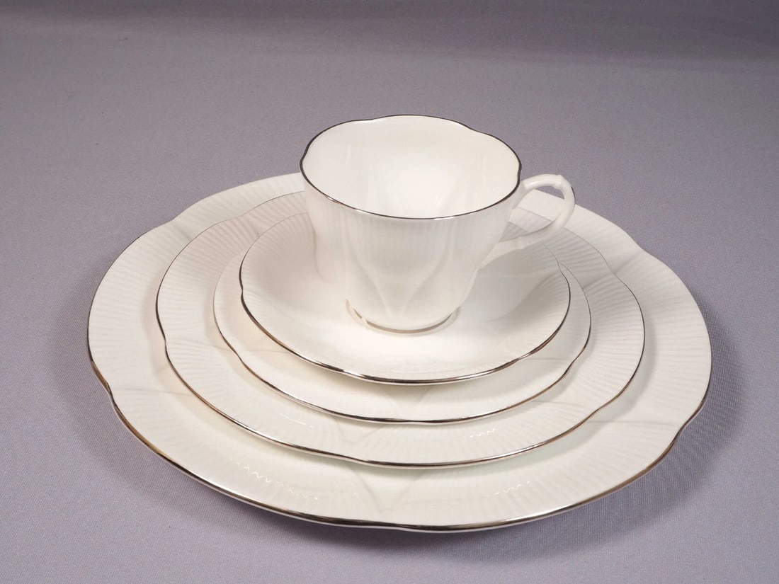 Royal Albert CLAIR DE LUNE England Bread Salad Plate Coffee Cup PLATINUM Dinner: This is a gorgeous Bone China Place Setting from the classic Pattern Clair De Lune by Royal Albert, Made in England. This elegant pattern features embossed border and platinum rim. It is perfect if yo