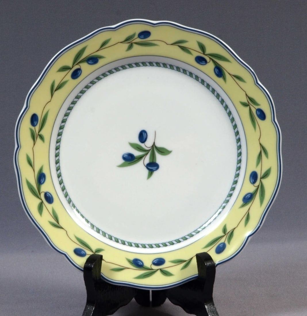 Hutschenreuther Medley Valdemossa 7 1/2" Salad Dessert Plate Yellow Band Blue: This is a gorgeous Salad/Dessert Plate by Hutschenreuther, Made in Dresden, Germany. The pattern is Medley Valdemossa in Maria Theresia Shape. The pattern is with olives on a pale yellow band and blue
