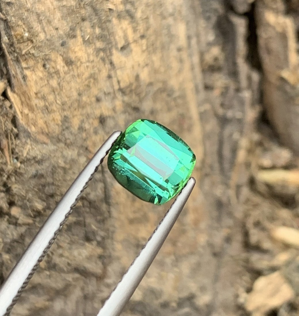 2 CT Natural Blue Green Tourmaline Gemstone: Step Cushion Cut: 2 CT Excellence Blue Green Tourmaline| Natural Tourmaline Gemstone|Step Cushion Cut |Loupe Clean Tourmaline|Ring/Jewelry Size Tourmaline Gemology : Dimensions (mm) 7*6.5*6* mm Weight (carats) 2 Carat