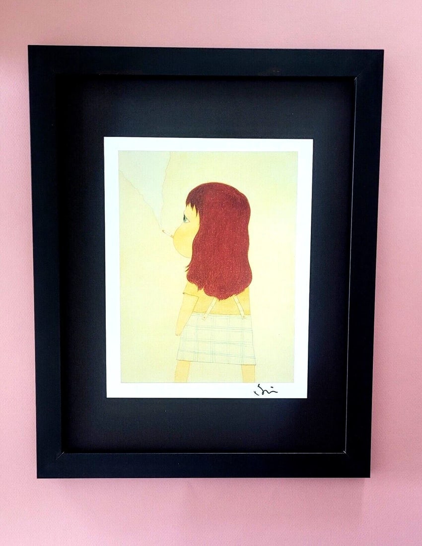 YOSHITOMO NARA | BEAUTIFUL PRINT FROM JAPAN | SIGNED MOUNTED AND FRAMED IN BLACK: YOSHITOMO NARA FRAMED PRINT FROM TOKYO FACSIMILE SIGNED IN INK MOUNTED IN A BLACKBOARD 14 X 11 in FRAME COVERS AN AREA OF 16 X 13 in MOUNTED AND FRAMED EXCELLENT CONDITIONS WILL BE CAREFULLY SHIPPED
