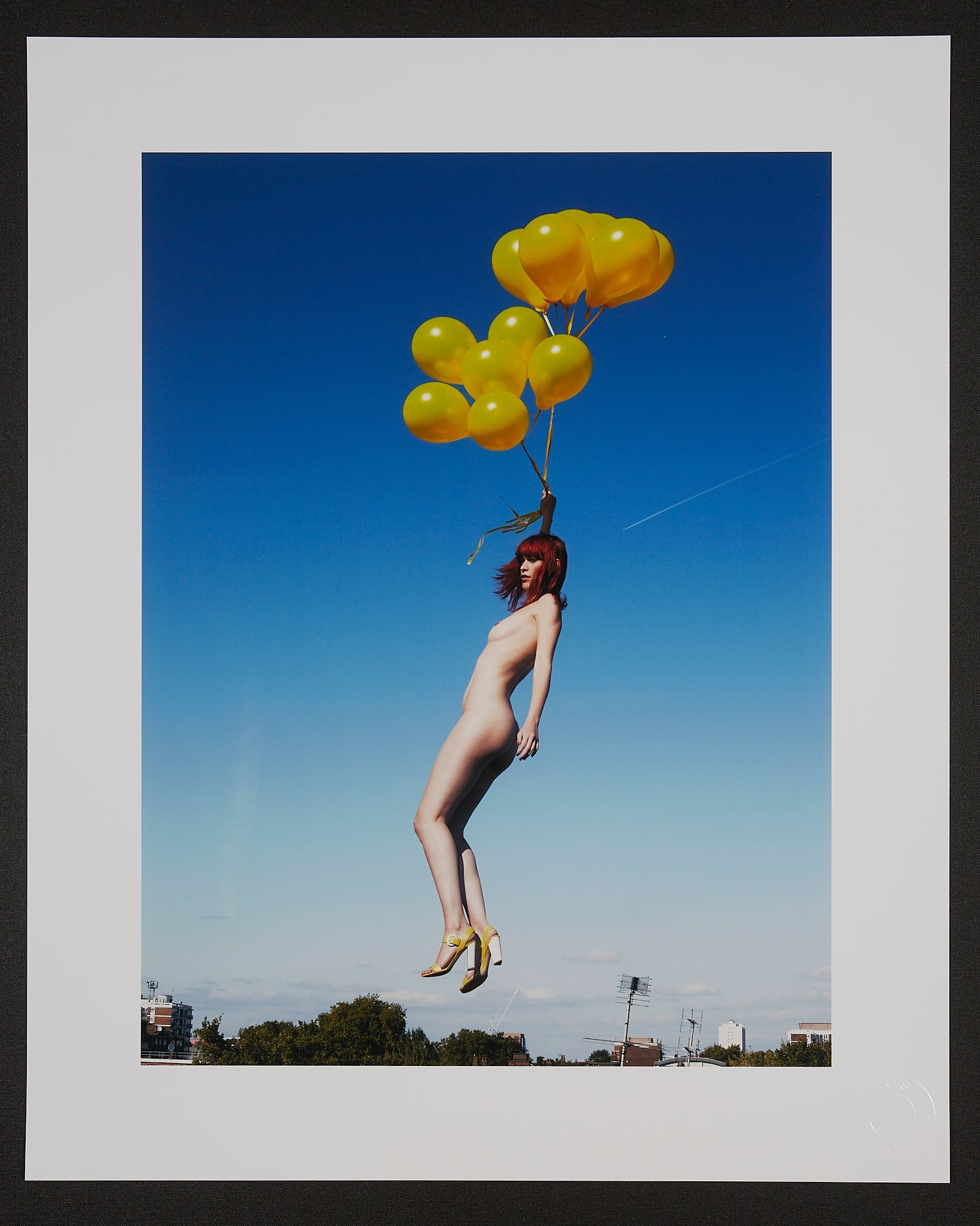 Spiros Politis: Yellow Balloon: Artist: Spiros Politis Title:Yellow Balloon Date/Period:2009 Size:20" x16" Description:"Yellow Balloons" (2009)Photographed on the artist's roof overlooking London. This humorous vibrant c-type print