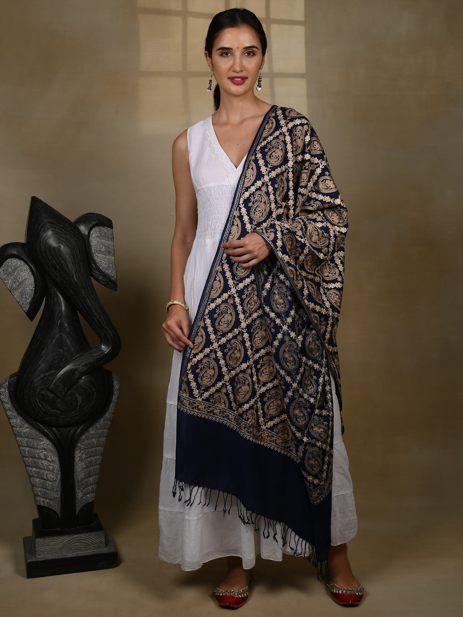 Pure Woolen Stole with Detailed Paisley Aari Threadwork from Kashmir: Title:Pure Woolen Stole with Detailed Paisley Aari Threadwork from Kashmir Reference:itemcode : GAG060-Navy Blue Reserve: $83.00 Shipping: Domestic: Shipping rates are determined by destination