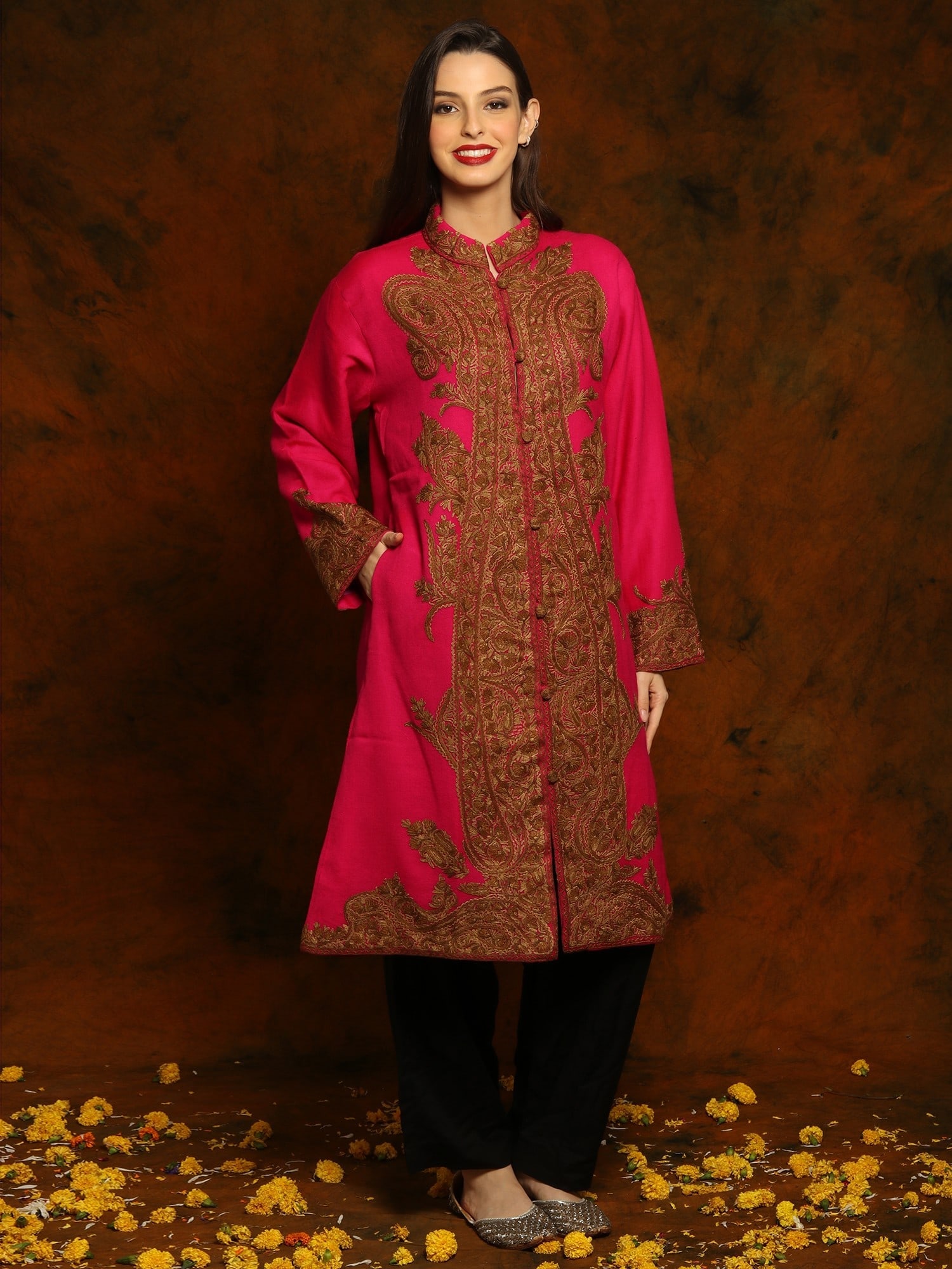 Kashmiri Magenta Pink Woolen Long Jacket with Detailed Floral and Paisley Aari Embroidery: Title:Kashmiri Magenta Pink Woolen Long Jacket with Detailed Floral and Paisley Aari Embroidery Reference:itemcode : GAF431 Reserve: $388.00 Shipping: Domestic: Shipping rates are determined by