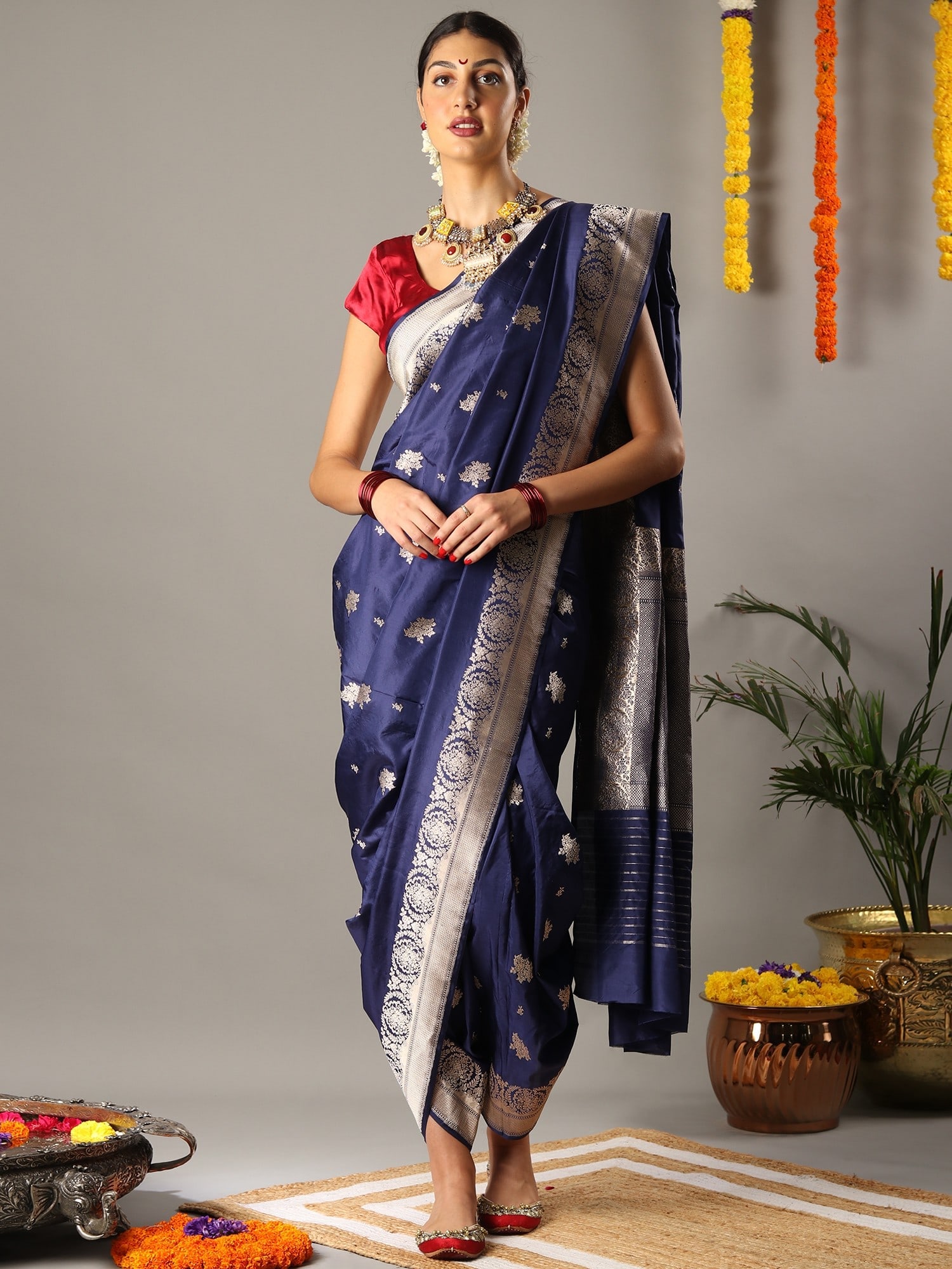 Navy Blue Banarasi Handloom Silk Zari Brocade Saree: Title:Navy Blue Banarasi Handloom Silk Zari Brocade Saree Description:The luxurious charm of blue is the canvas for the art of Banarasi weavers, in this Navy blue Banarasi silk saree, a must-have for