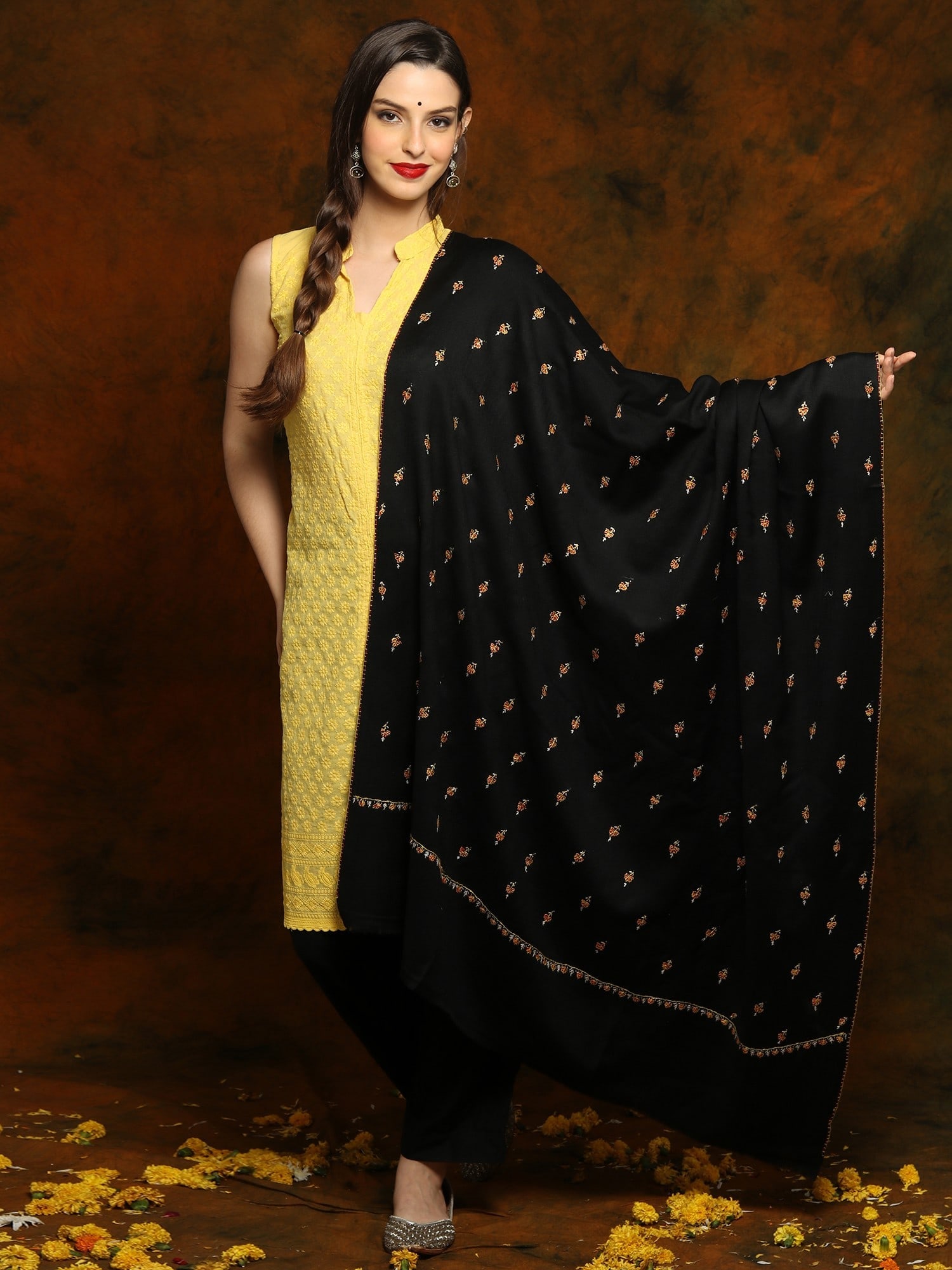 Black Fine Wool Shawl with Floral Fine Embroidery: Title:Black Fine Wool Shawl with Floral Fine Embroidery Description:This black delicate wool shawl brings elegance and simplicity. Made from pure wool, it has a timeless white floral embroidery