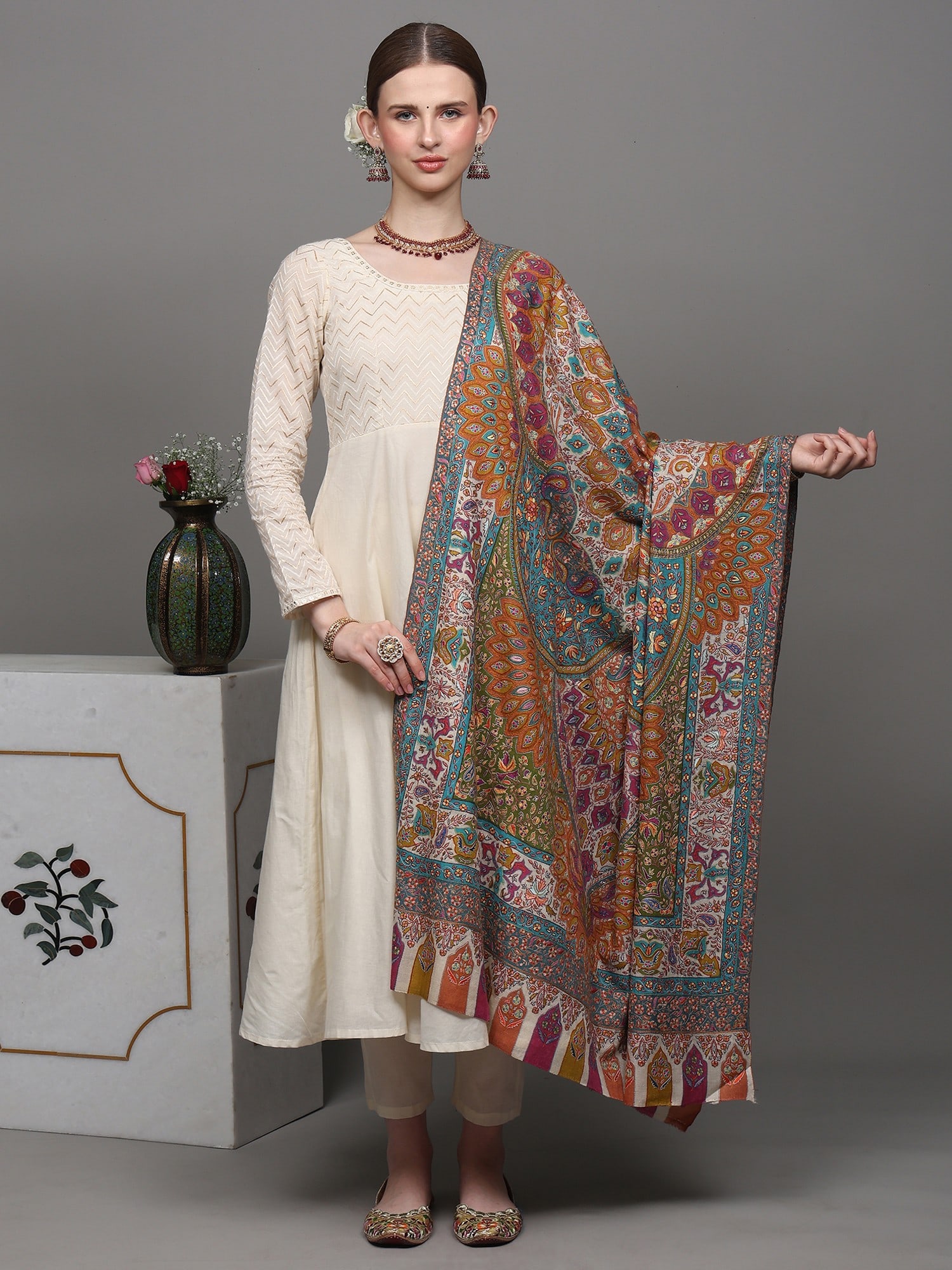 Pure Pashmina Kani Shawl with Heavily Multicolor Sozni Hand-Embroidered Paisleys and Flowers: Title:Pure Pashmina Kani Shawl with Heavily Multicolor Sozni Hand-Embroidered Paisleys and Flowers Description:This “ Pure Pashmina Shawl”, a masterpiece of luxury and craftsmanship, is a