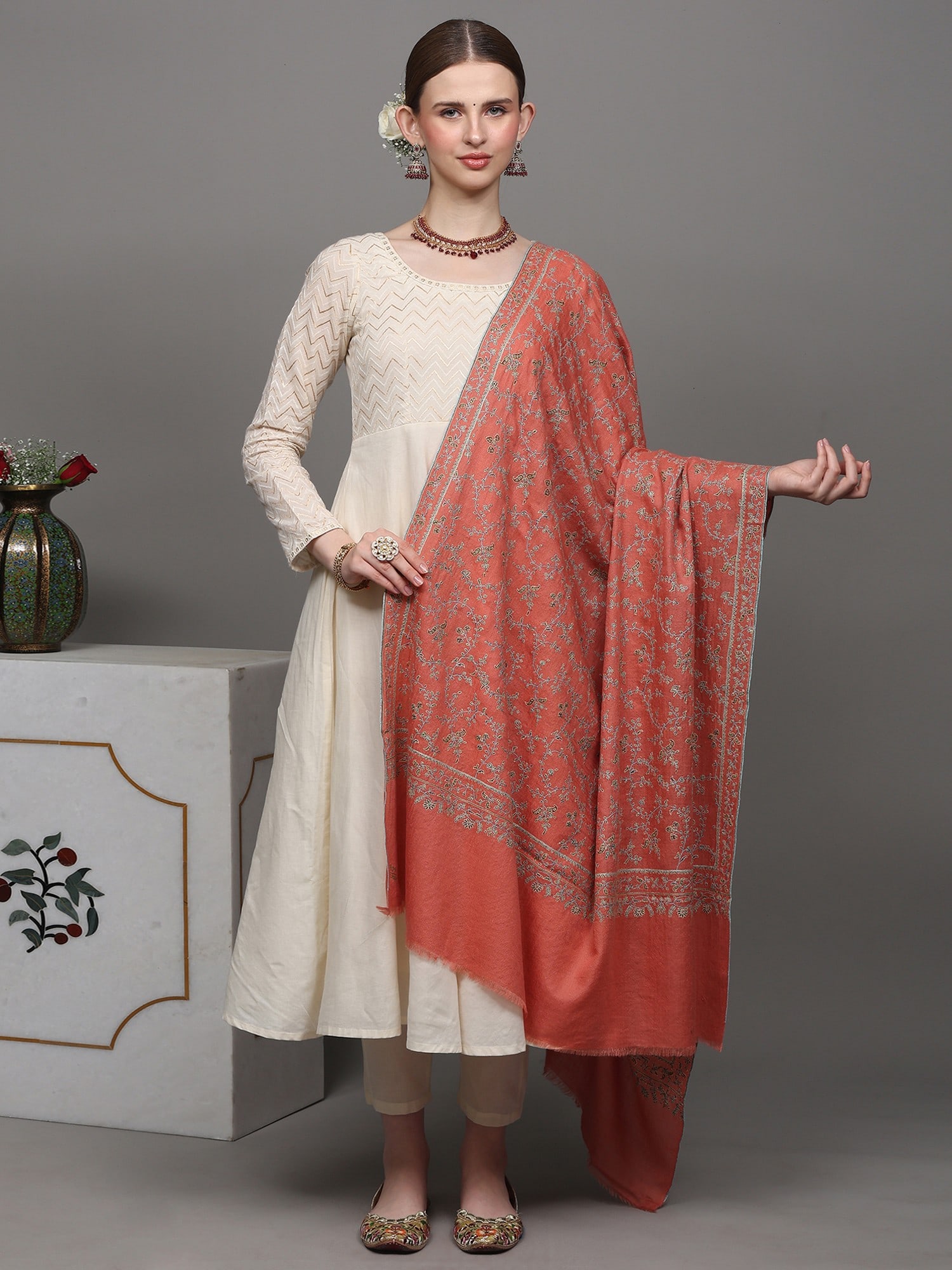 Terra-Cotta Pure Pashmina Shawl with Floral Jaaldar Sozni Embroidery by Hand: Title:Terra-Cotta Pure Pashmina Shawl with Floral Jaaldar Sozni Embroidery by Hand Description:Welcome to a voyage of unmatched luxury, the tangerine cashmere shawl with Floral design jaaldar sozni em