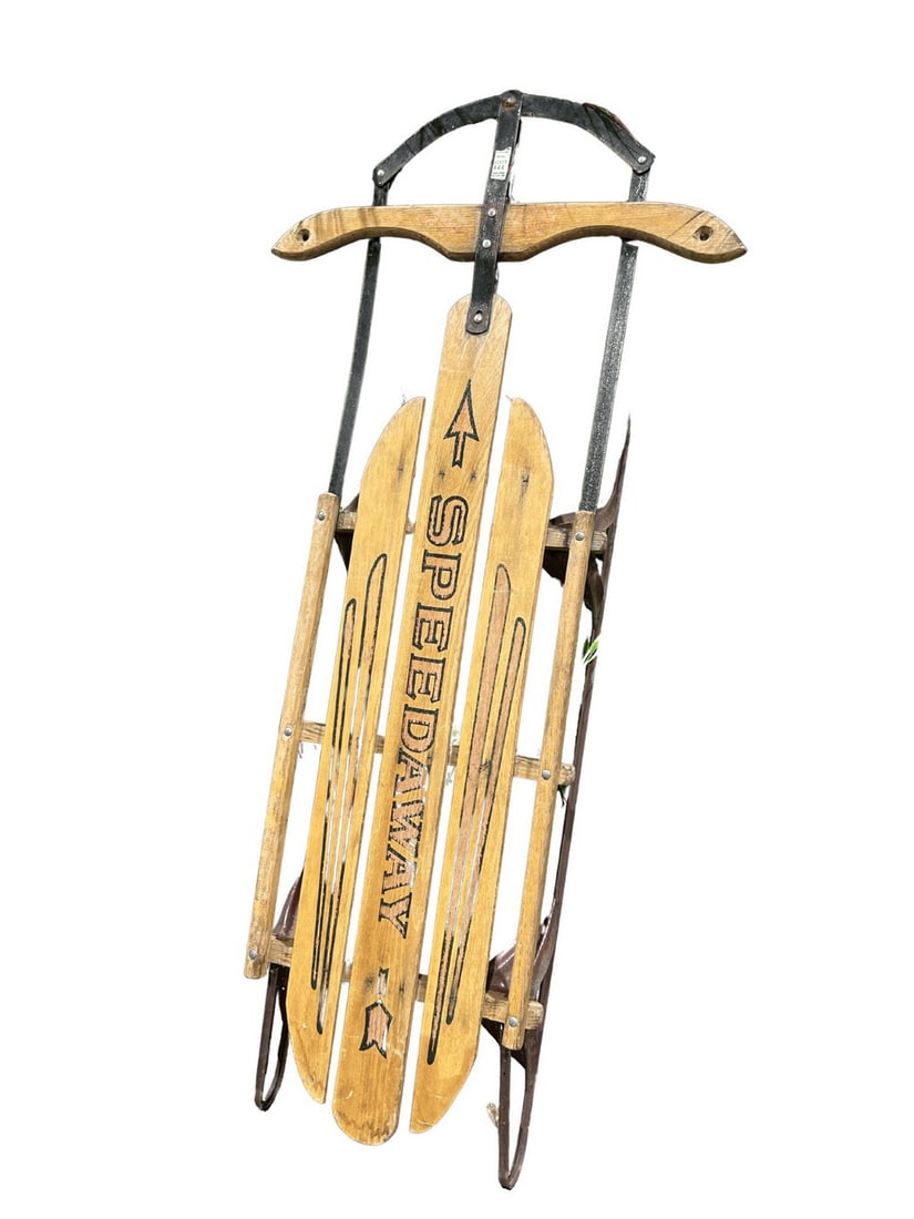 Vintage "Speedaway" Wooden Sled: A vintage "Speedaway" sled, likely dating from the mid-20th century, characterized by its classic wooden construction with metal runners and steering mechanism. The sled features "Speedaway" stenciled