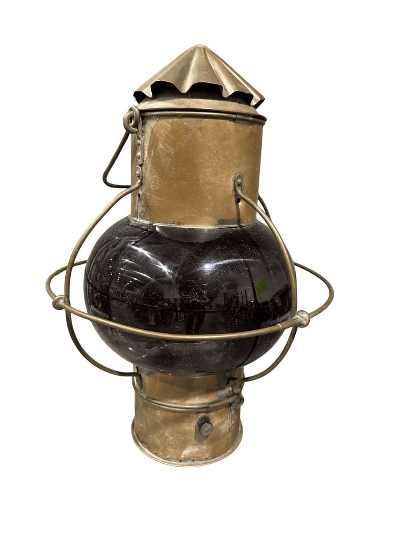 Antique Copper and Blown Glass Onion Lantern: This charming antique onion lantern features a hand-blown dark glass globe protected by a sturdy copper frame and cage. The top and bottom sections are also crafted from copper, exhibiting an