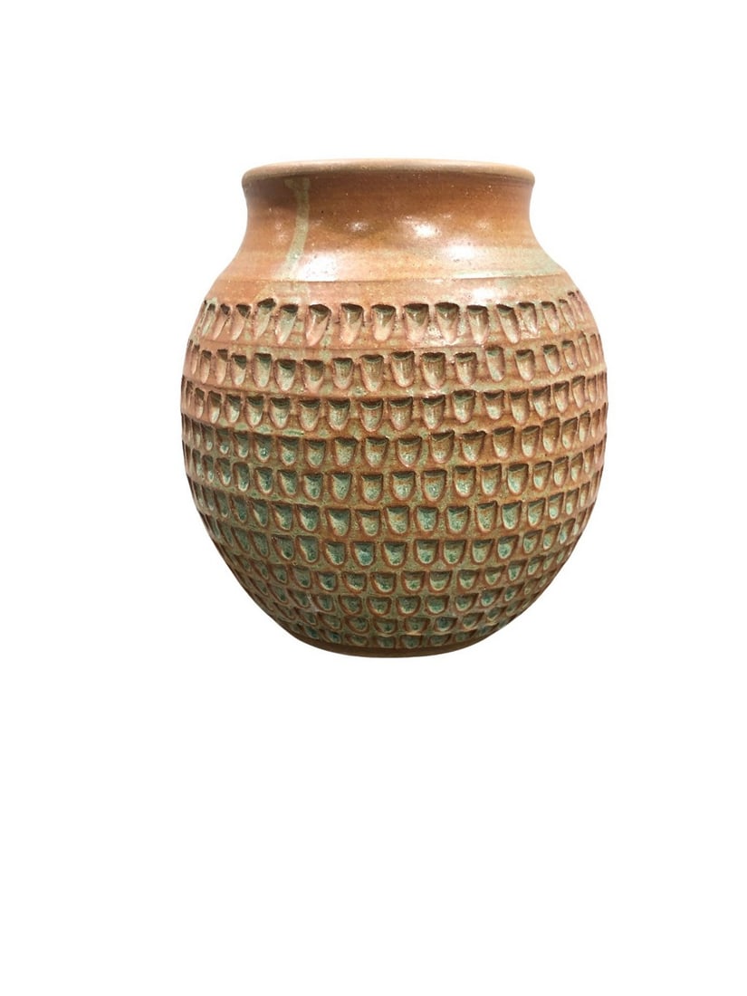 Studio Pottery Textured Vase: A charming studio pottery vase, likely mid-20th century, featuring a squat, globular form with a short neck. The exterior is adorned with a distinctive textured, geometric pattern across the body,