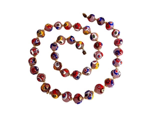 Vintage Murano Milliefiori 25" Beaded Necklace: Lovely lavender colored beads. Hand knotted with a brass barrel clasp. Measures 25 in length. Nice vintage condition. " Dimensions: Height , Width , Depth inches Weight Condition: Very Good Your
