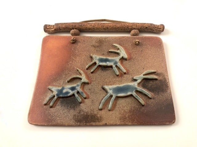 Decorative Art Pottery Tile: Measures 6.75" by 7.75" wide. Signed on reverse. Nice vintage condition. Dimensions: Height 7.75, Width 6.75, Depth inches Weight Condition: Good - Very good. Minor wear consistent with age. No chips