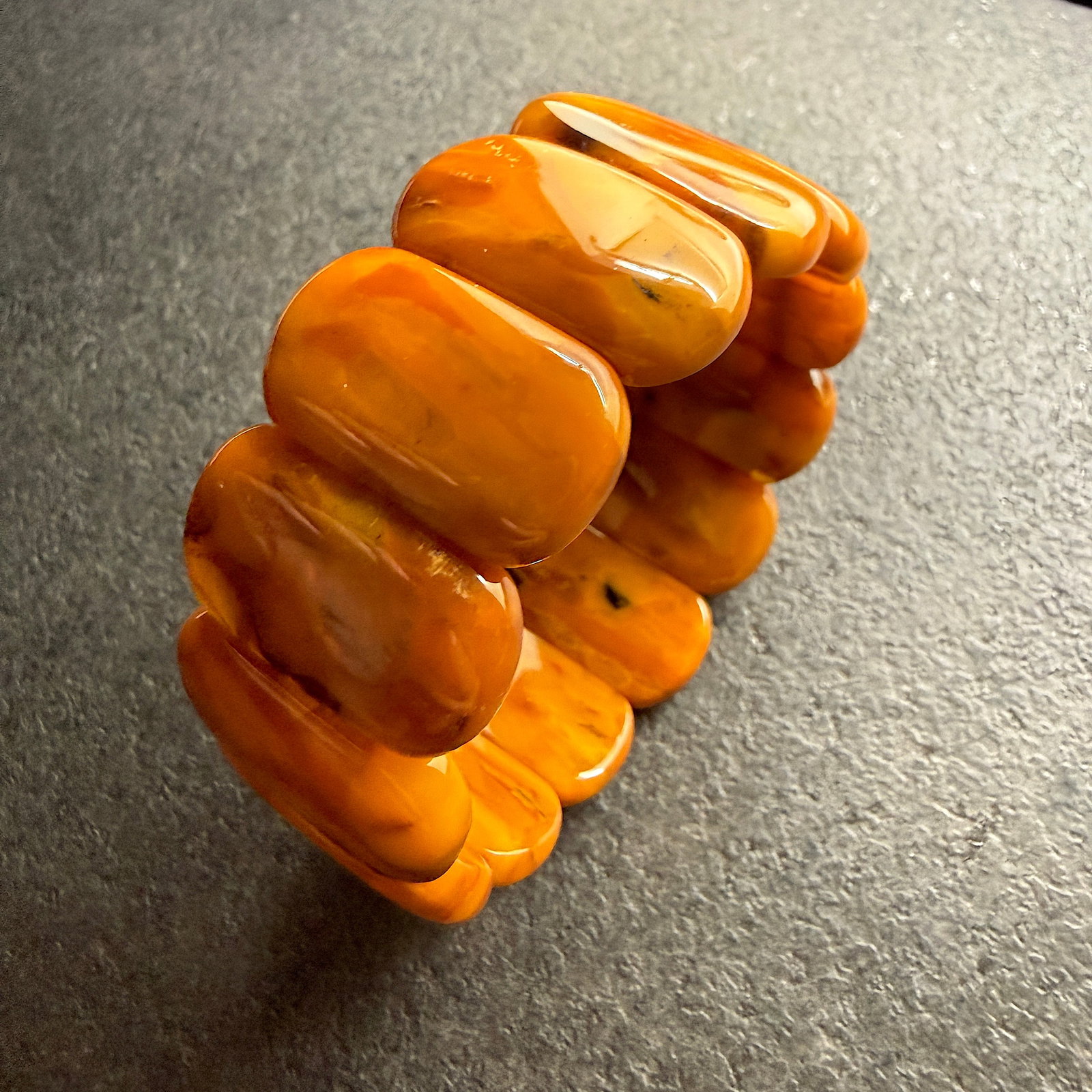Alluring Vintage Amber Cuff Bracelet: Title: Alluring Vintage Amber Cuff Bracelet Metal: None Gemstone: Reconstituted Amber Weight: 30.68 g Size: 70 x 28 mm Made of: (Reconstituted Amber or Whole Stone): Reconstituted Amber Additional